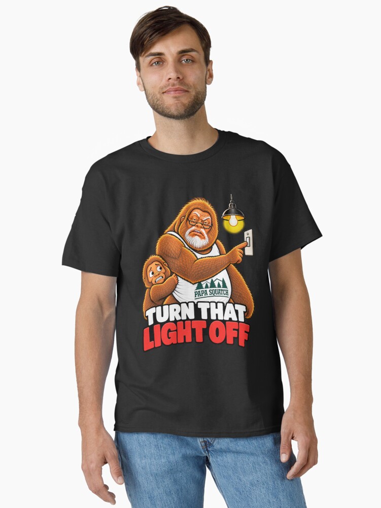Papa Squatch pointing at a light switch while a nervous Squatchling watches